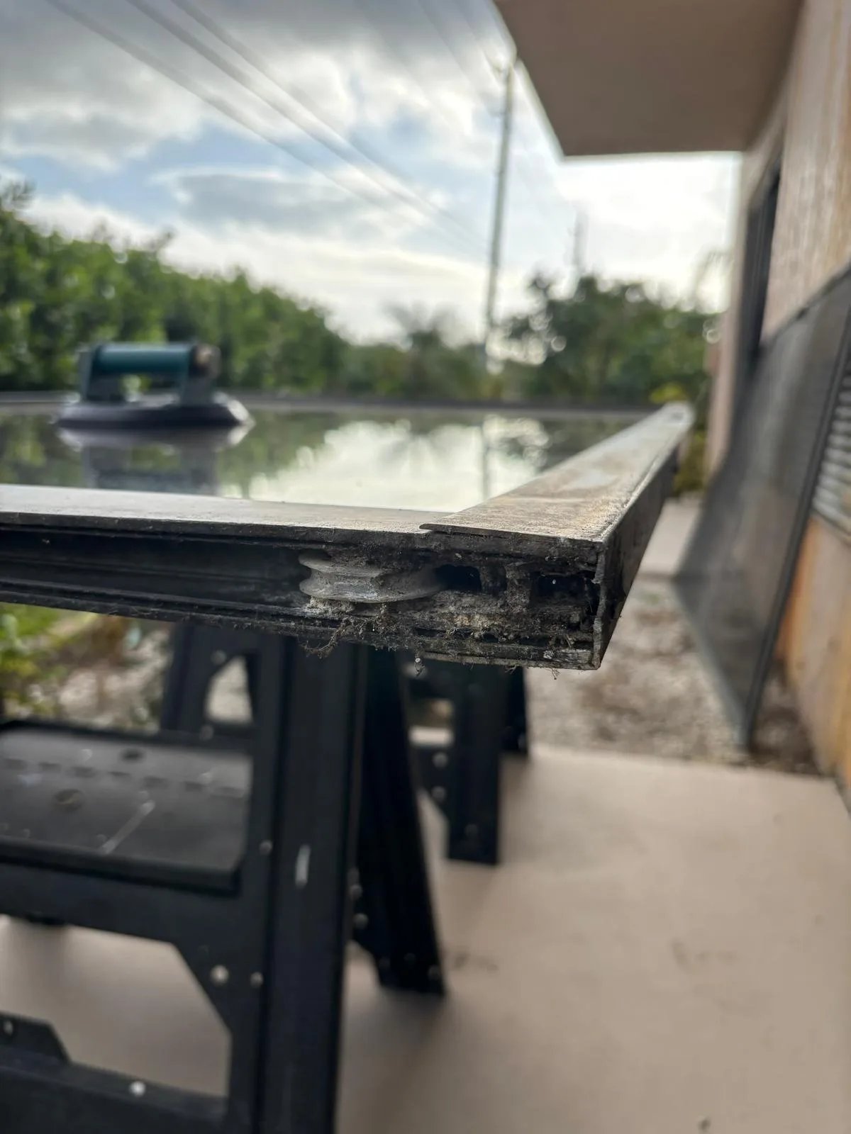 Sliding door components being serviced in South Florida