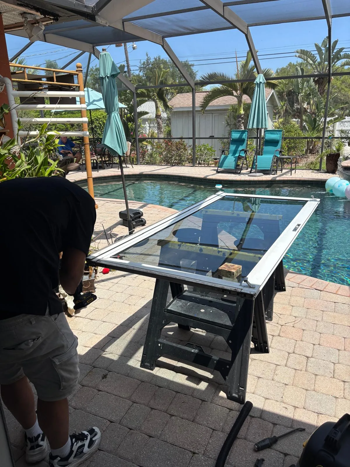 Sliding door components being serviced in South Florida