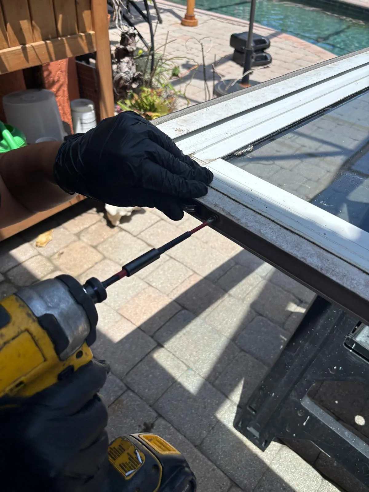 Sliding door components being serviced in South Florida