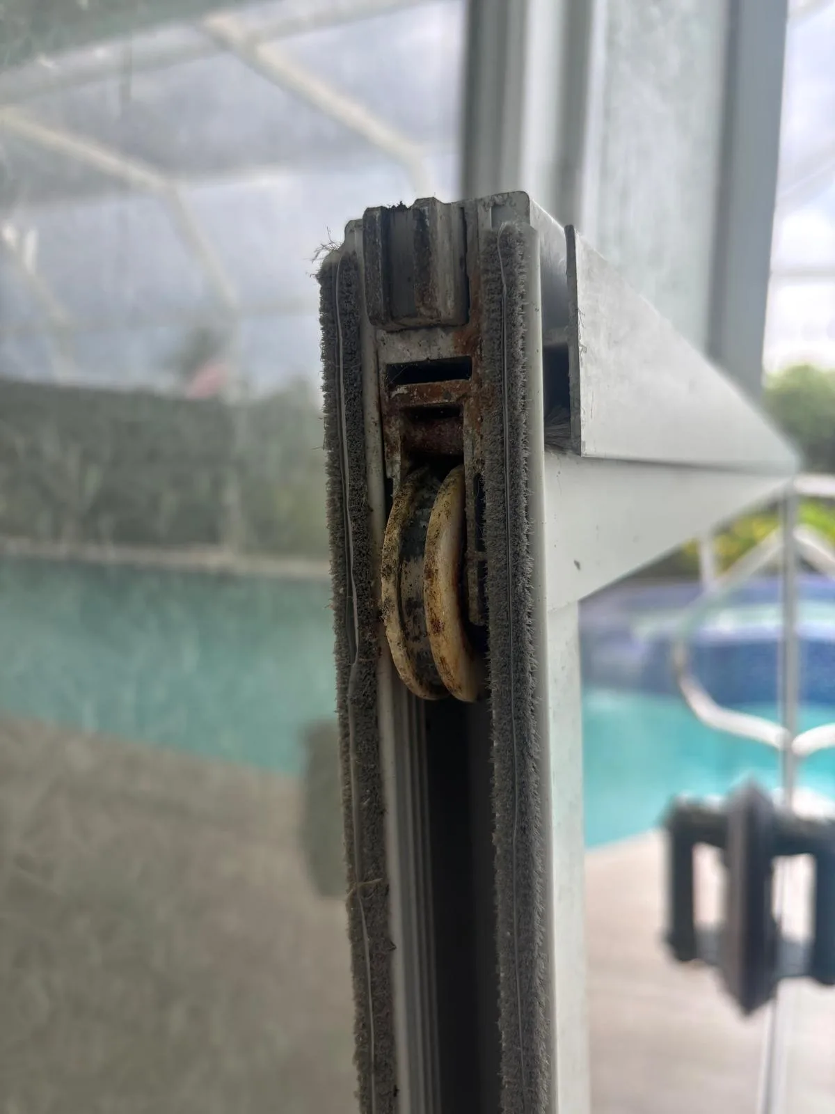Sliding door components being serviced in South Florida