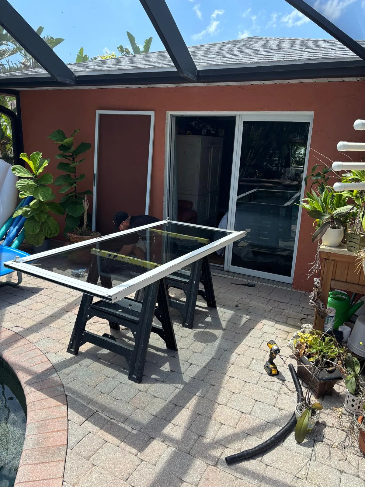 Sliding door components being serviced in South Florida